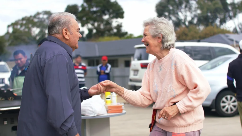 Elderly man and woman laughing together, representing compassionate NDIS and Aged Care support by SADisability Care