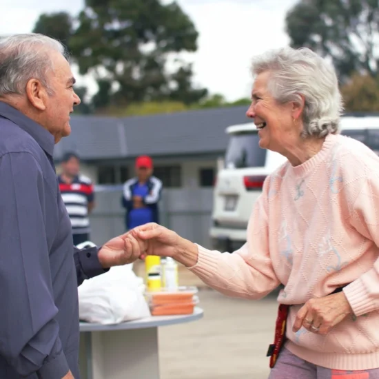 Elderly man and woman laughing together, representing compassionate NDIS and Aged Care support by SADisability Care