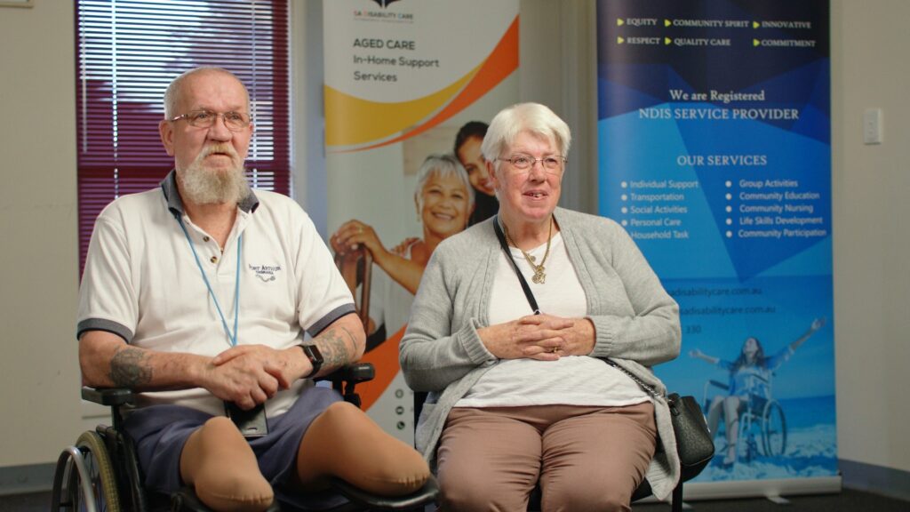 Elderly man and woman laughing together, representing compassionate NDIS and Aged Care support by SADisability Care