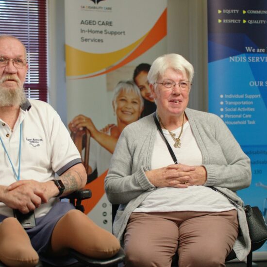 Elderly man and woman laughing together, representing compassionate NDIS and Aged Care support by SADisability Care